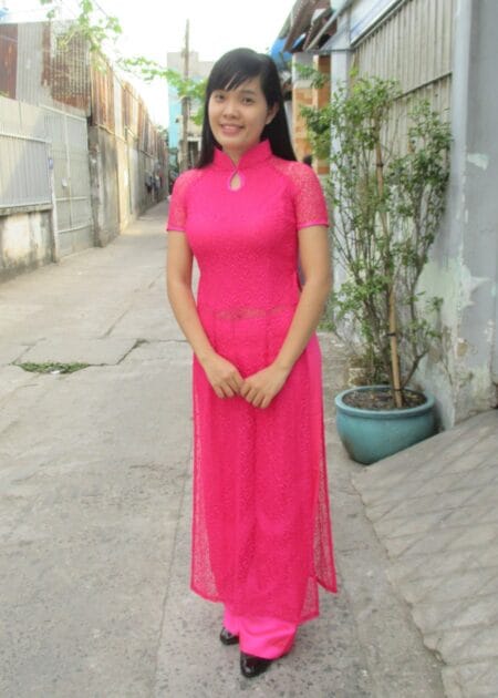 Áo dài lưới màu hồng