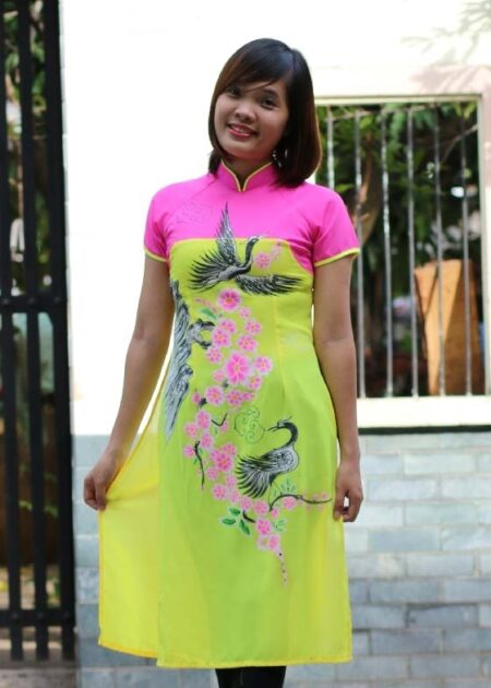 Áo dài nữ cách tân vàng hồng họa tiết chim cò