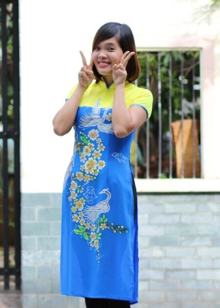 Áo dài nữ cách tân xanh dương vàng họa tiết chim cò