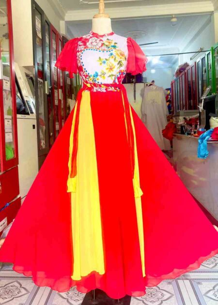 Đầm múa dài tông đỏ, ngực dán đá, tay cánh tiên, cổ trụ